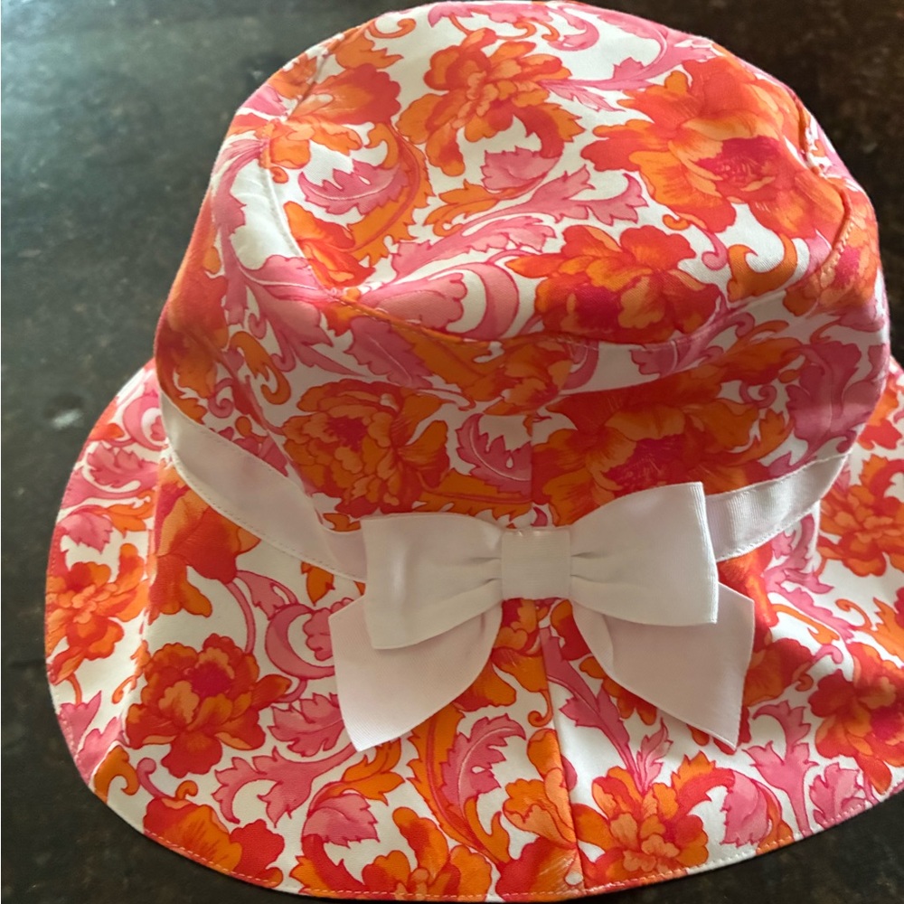 Janie and Jack Orange and White Bucket Hat with Floral Print